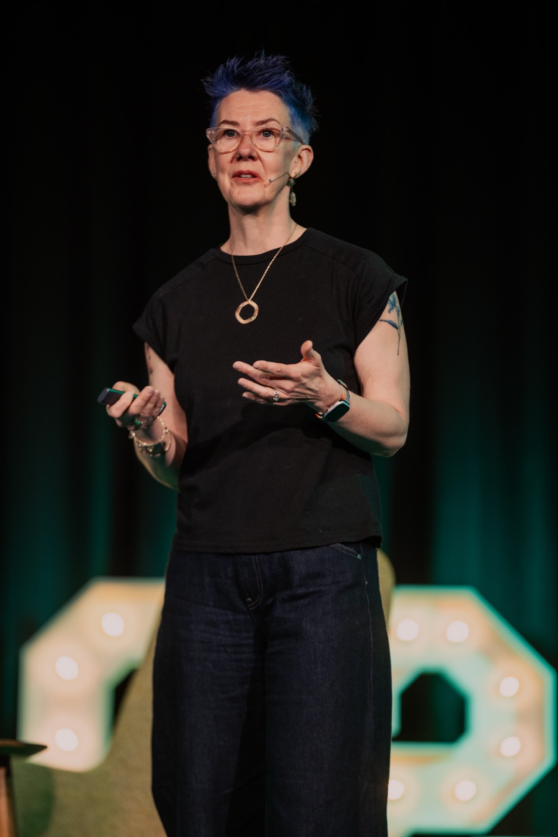 Becky Platt speaking at a TEDx event